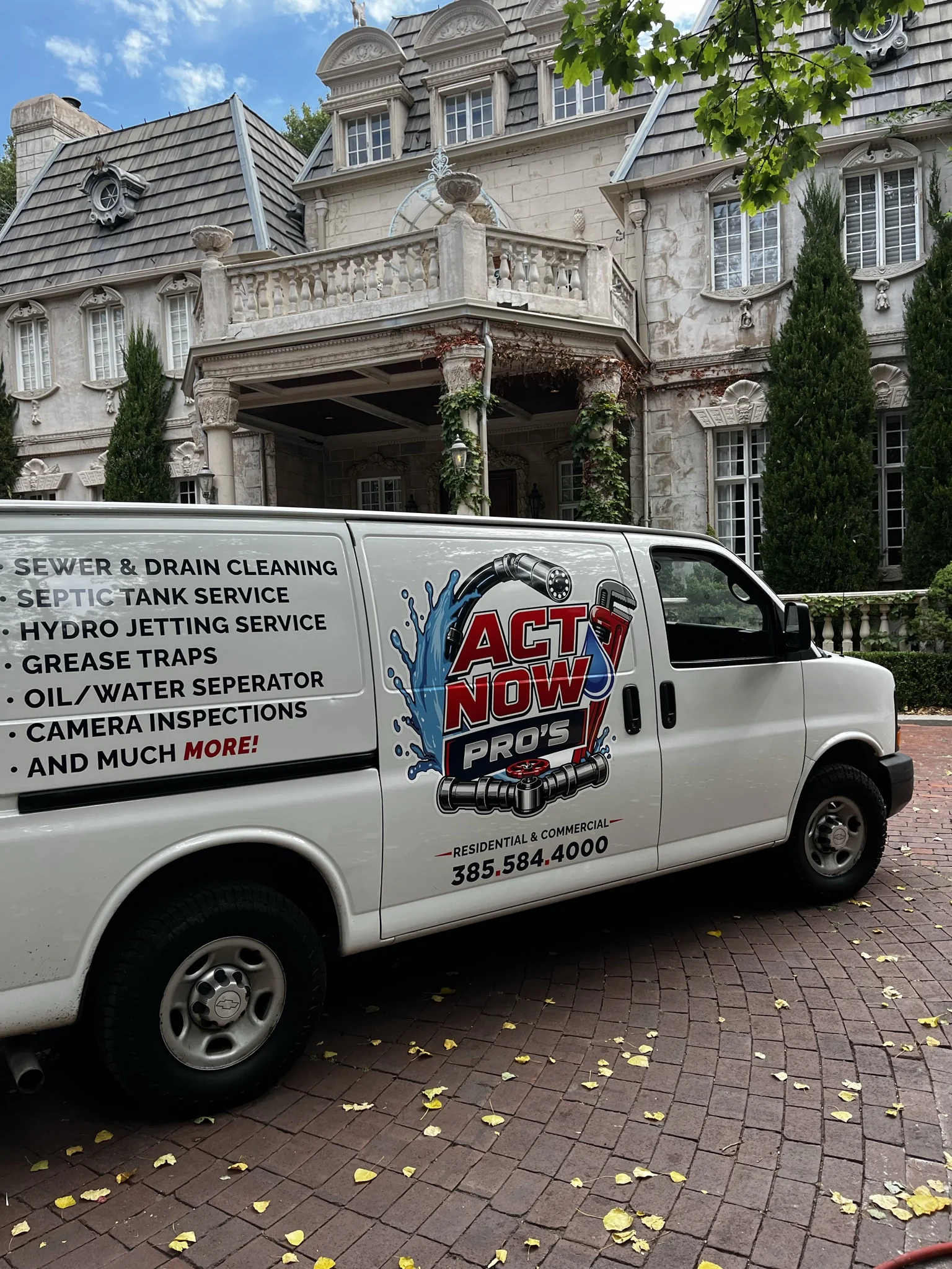Act Now Pros sewer and drain service van, lettered with sewer & drain cleaning, septic tank service, hydro jetting, grease traps, oil/water separator and camera inspections
